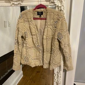 Cream faux fur coat